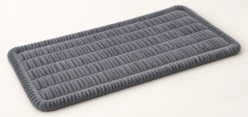 Grey segmented ribbed comfort pad, 51 by 24 inches